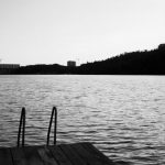 Outdoor Swimming - grayscale photo of wooden dock on body of water