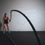 Innovative Gym Equipment - woman holding brown ropes