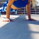 Workout Types - woman planking on gray asphalt road