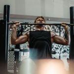 Weight Bench - man lifting barbell