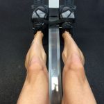 Rowing Machine - person sitting on rowing machine