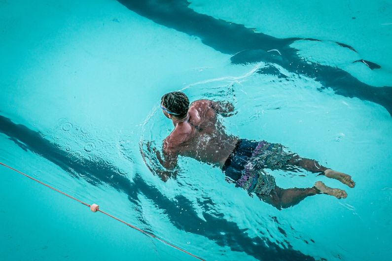 Swimming Cardio - man swimming in pool