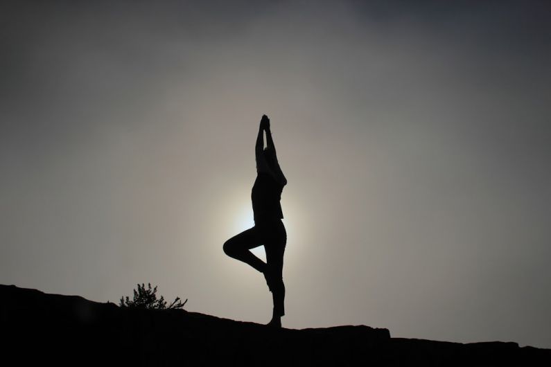 Yoga Mental - person doing yoga exercises