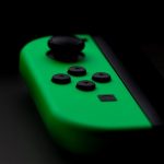 Breath Control - close-up photography of Nintendo Switch neon green controller